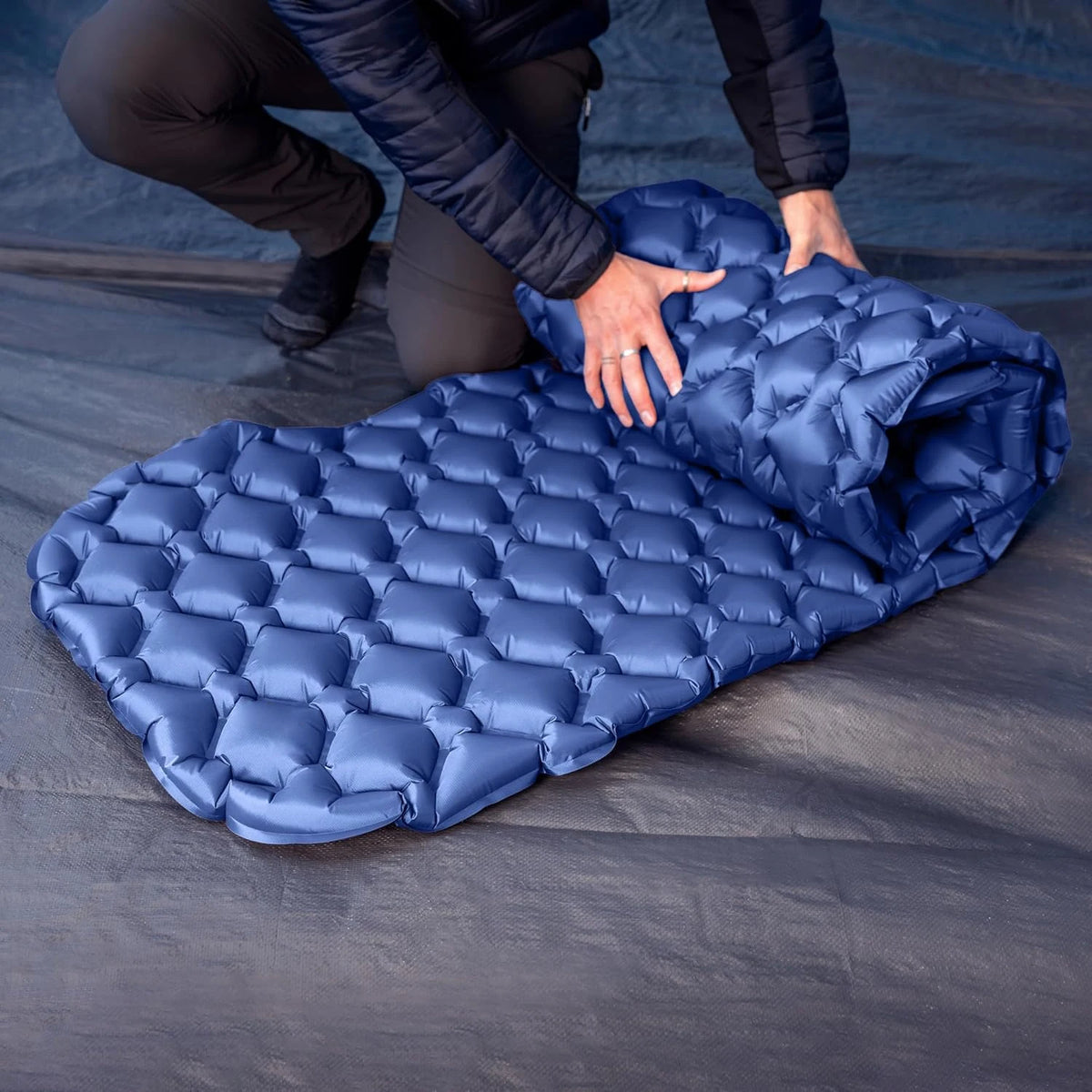 INFLATE-A-MAT Inflatable Sleeping Mat - rolling up for storage
